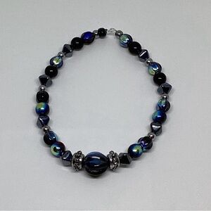 Galaxy themed bracelet with jet glass beads
